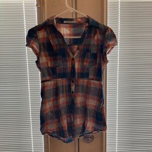 Trying to get rid of some clothing. Plaid short sleeve shirt.